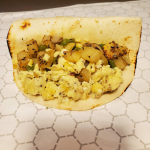 Seasoned potato with scrambled eggs